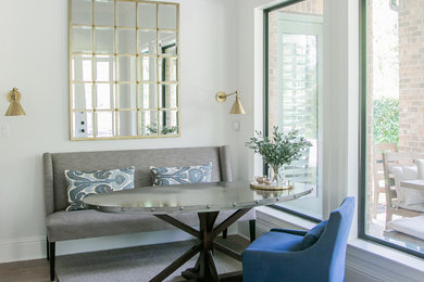 Example of a small danish light wood floor and beige floor great room design in Houston with gray walls and no fireplace