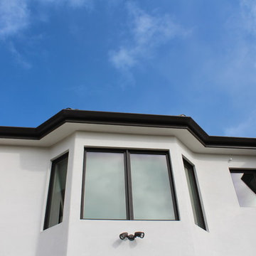 6 inch Angle Face/Flat Face Gutters with smooth Downspouts in Pacific Palisades