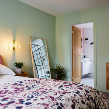 A pink and green master bedroom & ensuite design