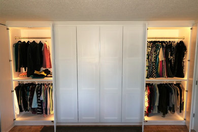 Example of an arts and crafts closet design in Charleston