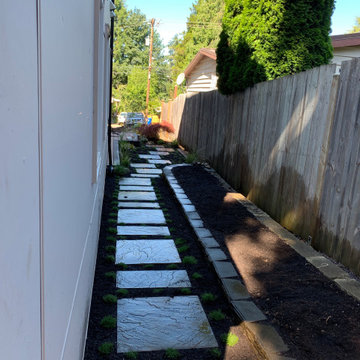 Deck platform, fence, hardscape, garden and planters.