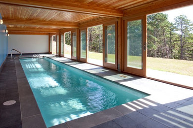 Example of a minimalist indoor pool design in Boston
