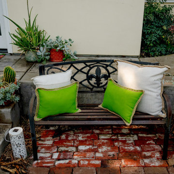 Back Stoop Seating with Reclaimed Brick and Metal Bench