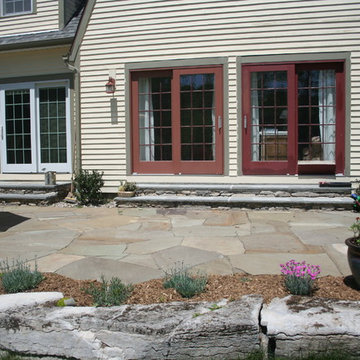 Limestone walls, water feature, flagstone patio