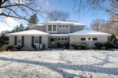 Inspiration for a large timeless exterior home remodel in Kansas City