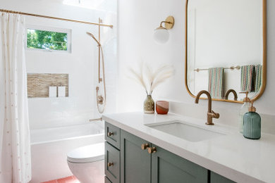 Mid-sized transitional kids' white tile and porcelain tile porcelain tile, pink floor and single-sink bathroom photo in San Francisco with shaker cabinets, green cabinets, a one-piece toilet, white walls, an undermount sink, quartz countertops, white countertops and a built-in vanity
