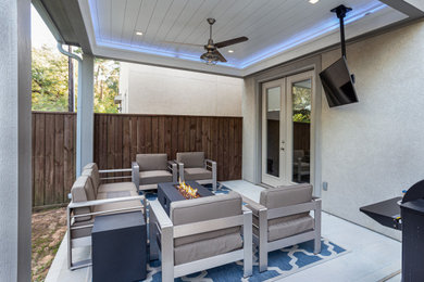 Patio - contemporary patio idea in Houston