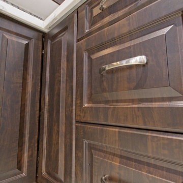 Soft-Close Dark Cabinetry with Corner Storage for Cookware | Downtown Toronto