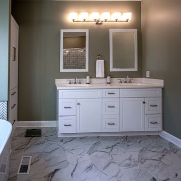 Serene Master Bath with Free Standing Tub, Tiled Shower and Linen Closet