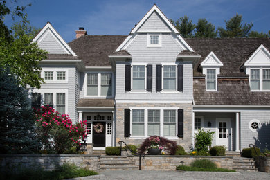 Huge traditional gray wood exterior home idea in Philadelphia