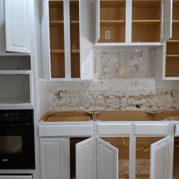 White kitchen - calcatta quartz, Salerno tile and extended cabinetry