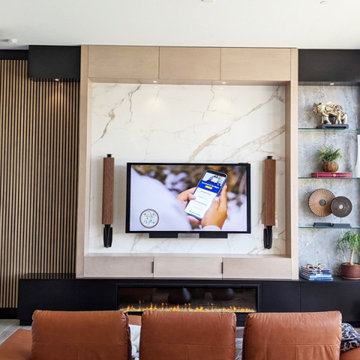 Custom Built-In Modern Entertainment Center with Wood Slatted Wall and Fireplace