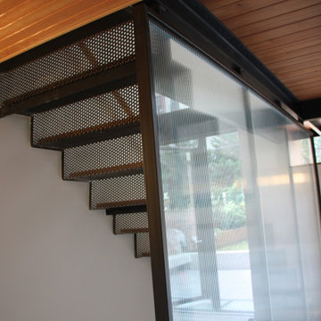 Glass and black metal railings