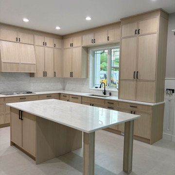 Modern White Oak Kitchen with Bold Black Handles