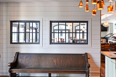 Dining room - cottage vinyl floor dining room idea in Philadelphia with white walls