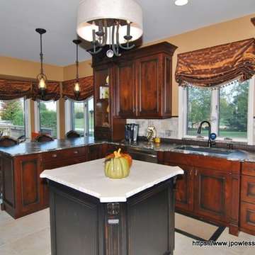 Kitchen Knotty cherry with black wrought iron accents