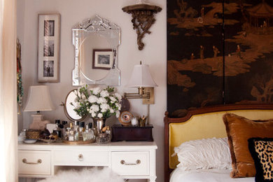 Inspiration for an eclectic master bedroom in New York with medium hardwood floors.
