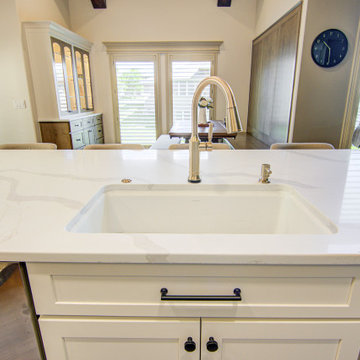 Collected Kitchen Remodel with Custom Seating + Layered Details