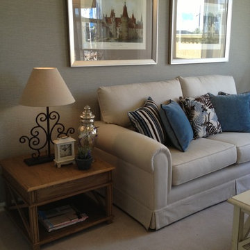 Surrey Hills, sea grass wallpaper and velvet cushions