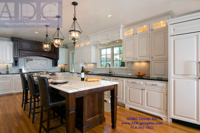 Eat-in kitchen - contemporary eat-in kitchen idea in New York with an undermount sink, beaded inset cabinets, white cabinets, granite countertops, white backsplash, subway tile backsplash and stainless steel appliances
