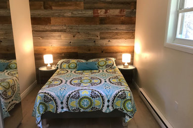 Example of a farmhouse bedroom design in Toronto