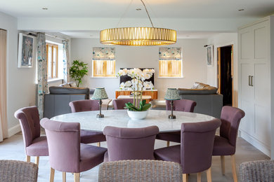 This is an example of a contemporary dining room in West Midlands.