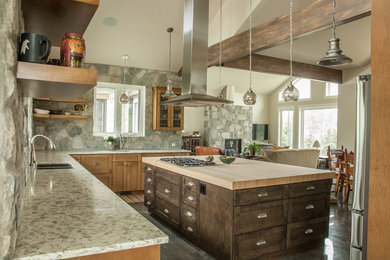 Eat-in kitchen - country l-shaped concrete floor eat-in kitchen idea in Vancouver with open cabinets, medium tone wood cabinets, wood countertops, stone slab backsplash, stainless steel appliances and an island