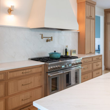 Warm Modern Kitchen Renovation with Natural Oak & Green Accents