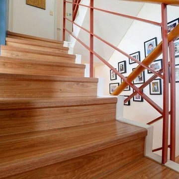 A Traditional Home Stairwell With Quick-Step Largo Flooring in Blackbutt
