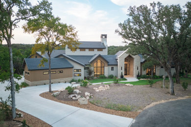 Transitional exterior home idea in Austin