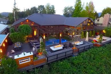 Large contemporary gray two-story mixed siding exterior home idea in Vancouver