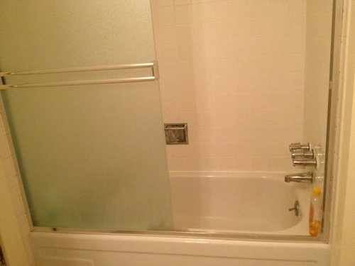 how to remove glass door from bathtub