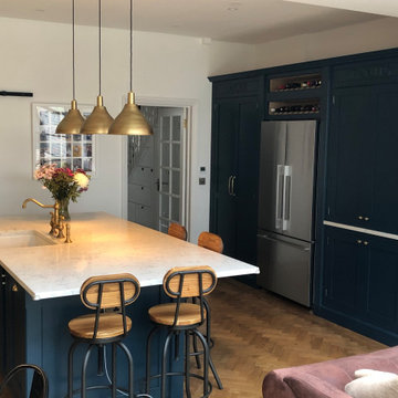 Stunning classic dark blue kitchen with a cafe style feel