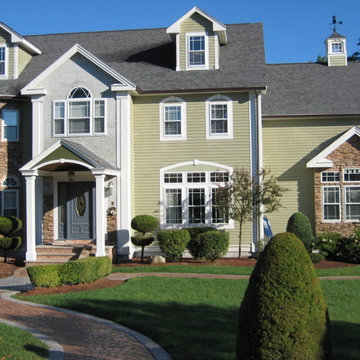 Ledgestone Veneer Facade w/ Brick Veneer Trim