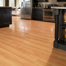 Light vinyl plank flooring with warm tone, durable