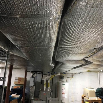 Installation of a hybrid system gas furnace with a heat pump.