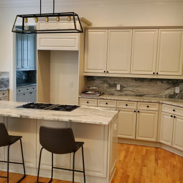 Home remodel. Paint house and cabinets, Install new lighting and floors.