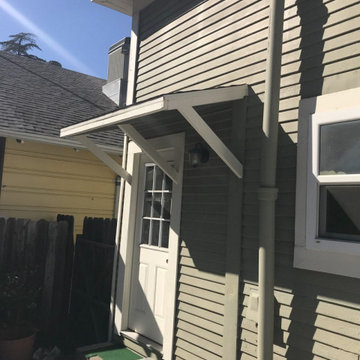 Support of the overhang, siding and exterior trim dry rot repair.