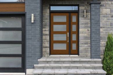 Single front door - modern single front door idea in Vancouver with a brown front door