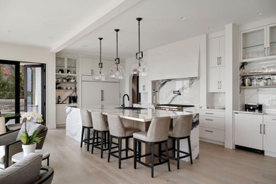 Photo of a large traditional kitchen in Vancouver with light hardwood flooring and grey floors.