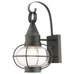 Livex Lighting - Charcoal Nautical, Farmhouse, Bohemian, Colonial, Outdoor Wall Lantern - The Newburyport outdoor medium single-light wall lantern boasts classic nautical and railway styling. This piece features a beautiful hand-blown clear glass globe and a charcoal finish over the hand crafted solid brass construction. With its easy installation and low upkeep requirements, this light will not disappoint.