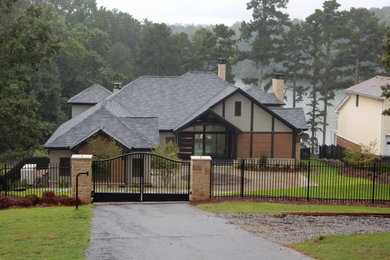 Example of a minimalist one-story mixed siding exterior home design in Atlanta with a shingle roof and a gray roof