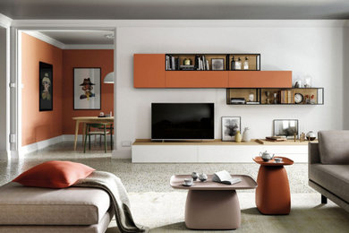 Esempio di un grande soggiorno design stile loft con sala formale, pareti arancioni, pavimento in marmo, nessun camino, parete attrezzata, pavimento multicolore e tappeto