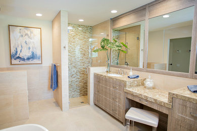 Design ideas for a mid-sized transitional master bathroom in Other with flat-panel cabinets, light wood cabinets, a freestanding tub, an alcove shower, beige tile, blue tile, brown tile, glass tile, beige walls, porcelain floors, an undermount sink, quartzite benchtops, beige floor and a hinged shower door.
