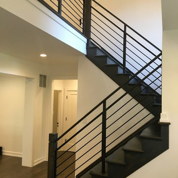 Amanda - horizontal steel railing with wooden newel posts