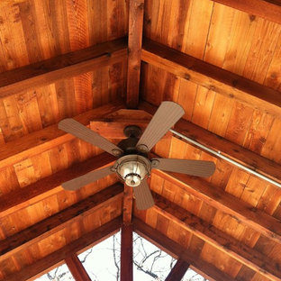 Mid-sized country backyard patio in Dallas with a fire feature and a gazebo/cabana.