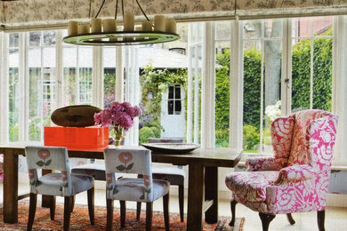 Example of an eclectic dining room design in New York
