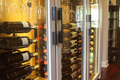 Large transitional dark wood floor wine cellar photo in Other