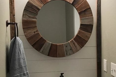 Inspiration for a country powder room remodel in Other