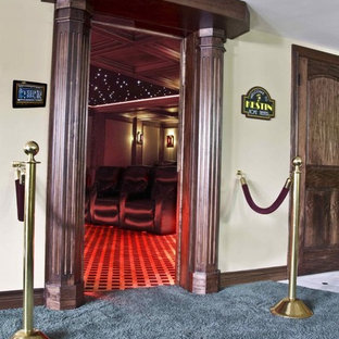 Example of a mid-sized classic enclosed carpeted home theater design in Grand Rapids